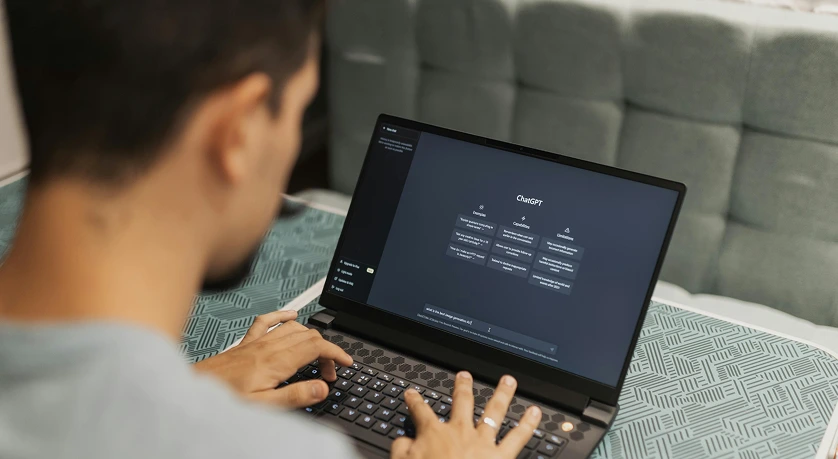 Person using laptop with Chat AI interface screen representing artificial intelligence tools by My Digital Solutions in the UK.