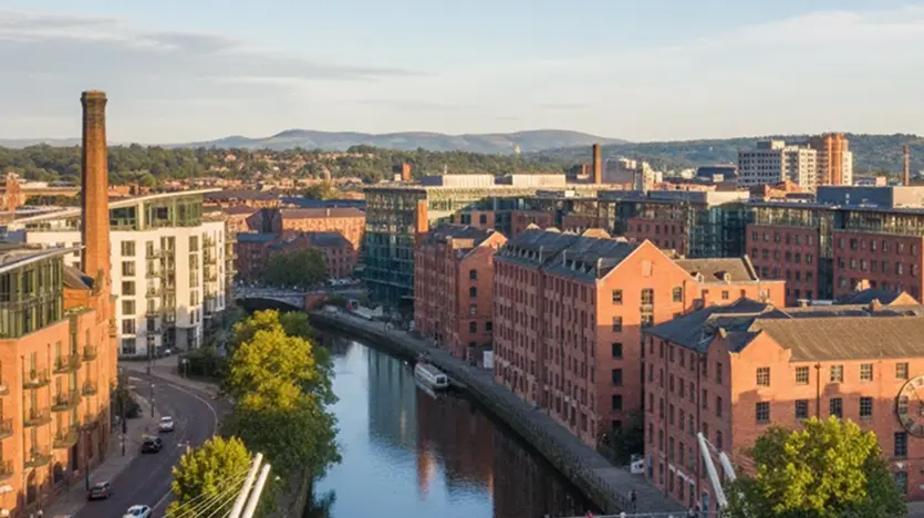 Aerial view of Tameside’s historic red-brick mills and canals, showcasing Greater Manchester’s industrial heritage.